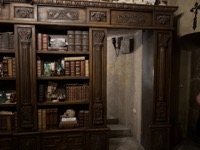 Speculum Alchemiæ bookcase being opened